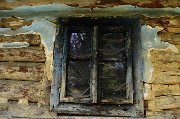 Old wooden house in the forest