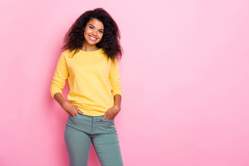 Portrait of positive cheerful african girl have weekends free time listen her friends wear yellow...