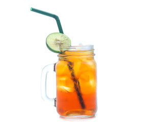 jar glass of iced tea with lemons  isolated on a white background