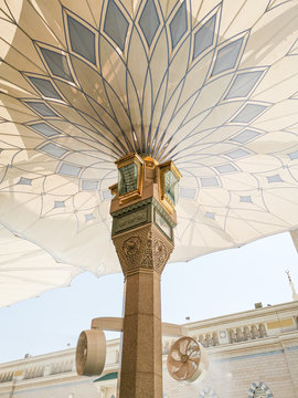 Medina, Saudi Arabia - March 22, 2018 : Exterior view of umbrella tower in Nabawi Mosque (Prophet Mosque) building in Medina. Selective focus