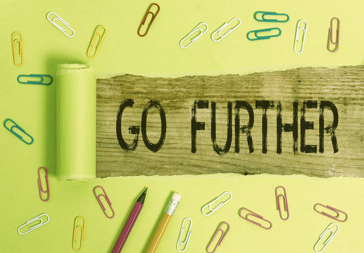 Conceptual hand writing showing Go Further. Concept meaning To move to a greater distance or overcome your limitations