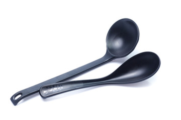 plastic black spoon, isolated on white background