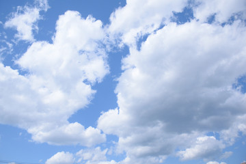 clear blue sky and clouds.
