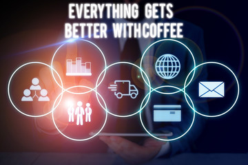 Conceptual hand writing showing Everything Gets Better With Coffee. Concept meaning Have a hot drink when having problems Male wear formal suit presenting presentation smart device