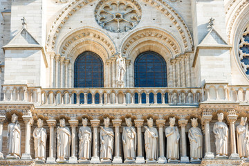 Architectural details on facade of famous cathedral Notre-Dame de Paris. Paris, France before fire April 15, 2019