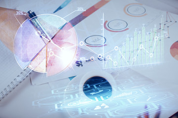 Multi exposure of man planing investment with stock market forex chart.