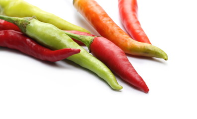 Fresh spicy peppers, paprika isolated on white background 