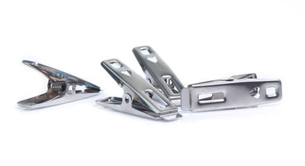 Obraz premium Peg steel, metal clothespin isolated on white background