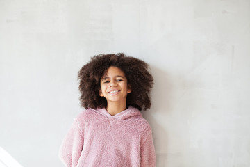 Сute girl in soft cosy hoodie