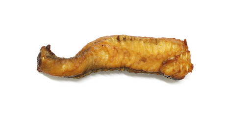 Slice of fried dried fish on white background