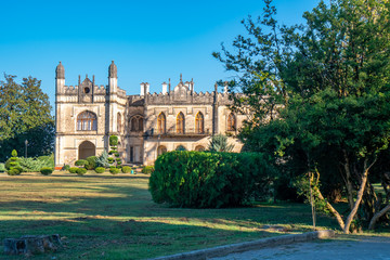 Fototapeta na wymiar Dadiani Palaces Historical and Architectural Museum located inside a park in Zugdidi, Georgia.