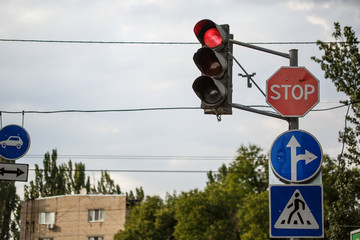 traffic light the three colors, with red stop sign