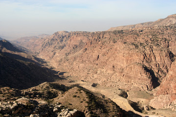 Fototapeta na wymiar misty canyon in Dana reserve, Jordan