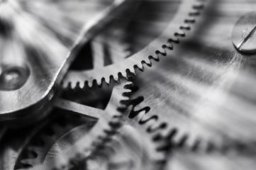 Gears black-and-white. Industrial background. The concept of technology, time, teamwork, infinity,...