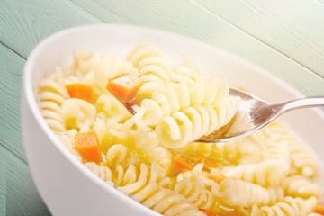 Vegetable soup isolated on a white background