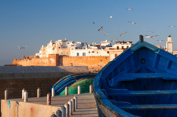 City view of Essaouira / City view of Essaouira with fishing boat, Morocco, Africa. - obrazy, fototapety, plakaty