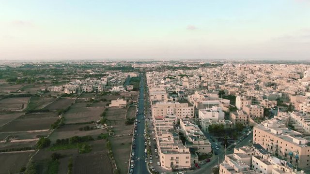 aerial view of the Zurrieq Village, Malta aerial drone tilt down flyover shot
