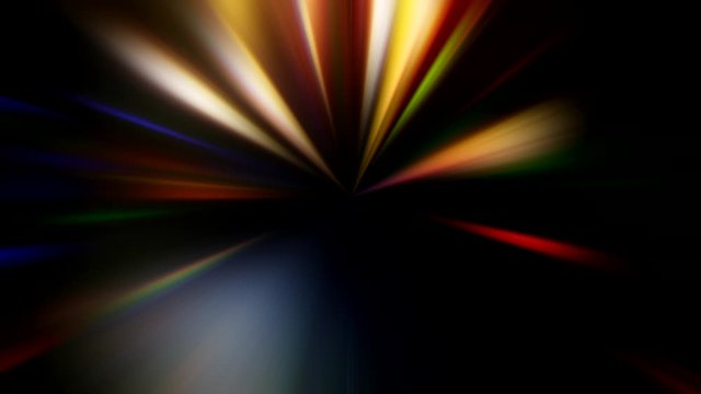 Rays stream. Superspace effect. Multicolor lights motion on black background.