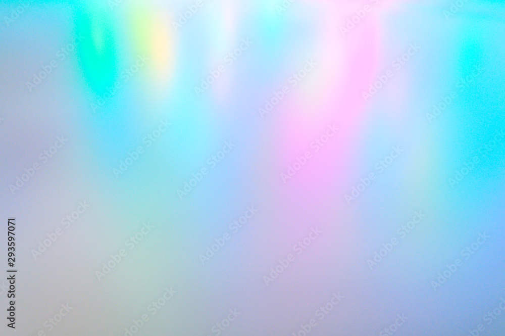 Wall mural blurred multicolored background from light. iridescent holographic abstract soft pastel colors backd