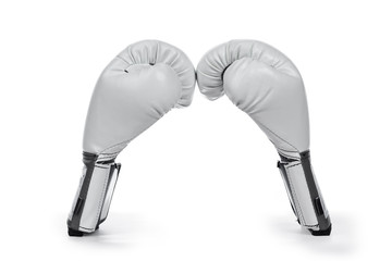 Side view of white leather boxing gloves. Isolated on white background.