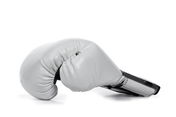 Side  view of single white leather boxing glove. Isolated on white background.