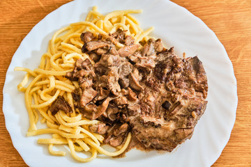 Beef with bolete sauce and spatzle