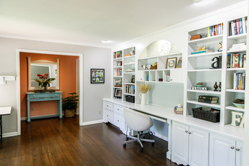 Colorful living room Home office area modern and clean and well organized with desks and chairs and...