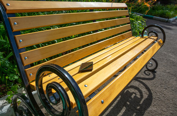 A mobile phone incidentally left on a bench in a park. Concept of loss of valuable property, access...