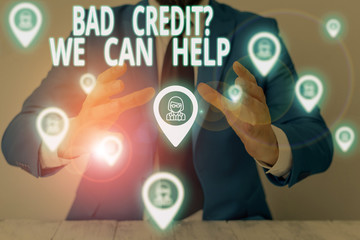 Conceptual hand writing showing Bad Credit Question We Can Help. Concept meaning Borrower with high risk Debts Financial Male wear formal suit presenting presentation smart device