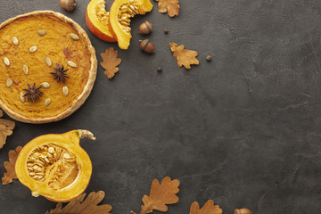 Flat lay frame with autumn leaves and pie