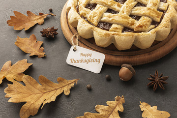 High angle assortment with delicious pie and leaves