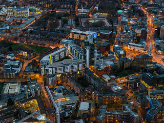 Elevated urban cityscape view of London, England at night time