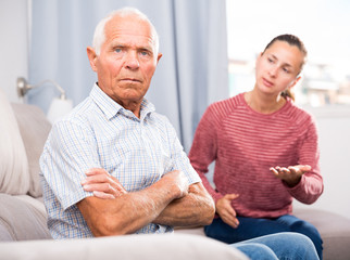 Home quarrel adult daughter and elderly father