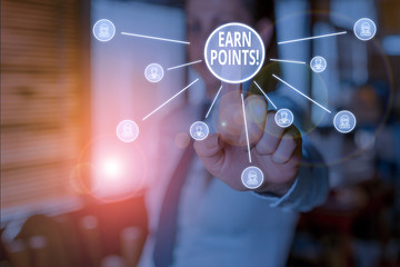 Conceptual hand writing showing Earn Points. Concept meaning collecting scores in order qualify to...