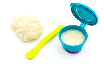Baby first solids. Weaning. Homemade vegetable cauliflower puree