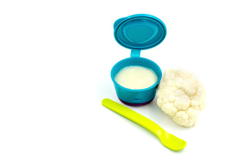 Baby first solids. Weaning. Homemade vegetable cauliflower puree
