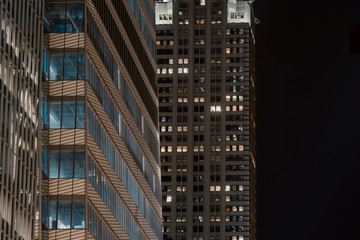 modern buildings in manhattan new york usa night photography condominium corporate office wall street financial center rental real estate leasing downtown tower high ground 