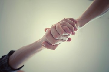 handshake between two man and woman, Closeup of people shaking hands