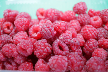 Raspberries pattern. Fresh organic raspberry background. Healthy eating, fruits. Full frame 