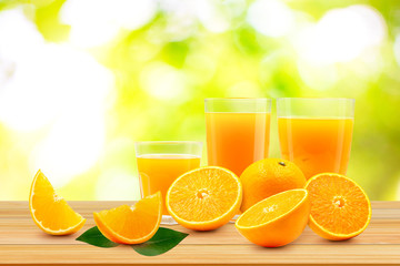 Stack of fresh orange fruit on wooden.