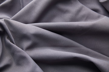 Fototapeta premium background of grey crumpled textured cloth