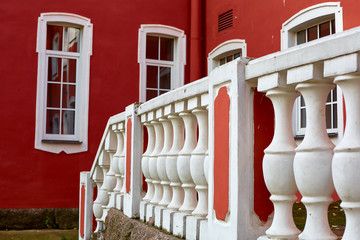 white balusters of the red house