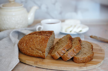 sliced bread, homemade cheese prepared for breakfast