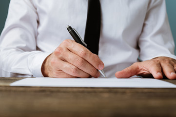 Businessman signing a contract