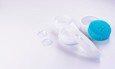 Contact lenses. Case with tongs. Poor vision