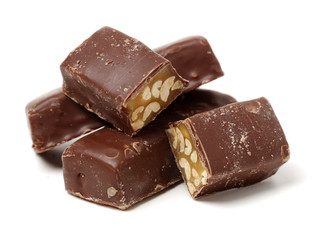 Chocolate peanut candy on white background