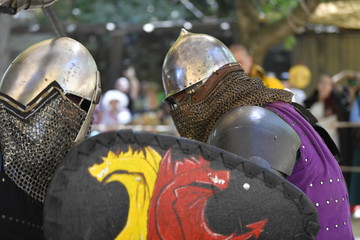 Knights are fighting on the battlefield during the festival 