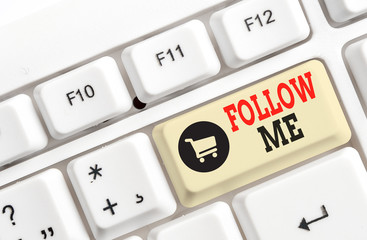 Text sign showing Follow Me. Business photo text Inviting a demonstrating or group to obey your prefered leadership White pc keyboard with empty note paper above white background key copy space
