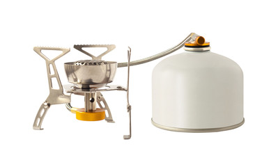 Camping gas stove and canister with compressed gas isolated on white background
