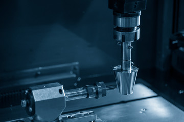 The sinker EDM machine simulation operation with the sample parts. The mould and die manufacturing process by Electrode Discharge Machine with the copper material electrode.